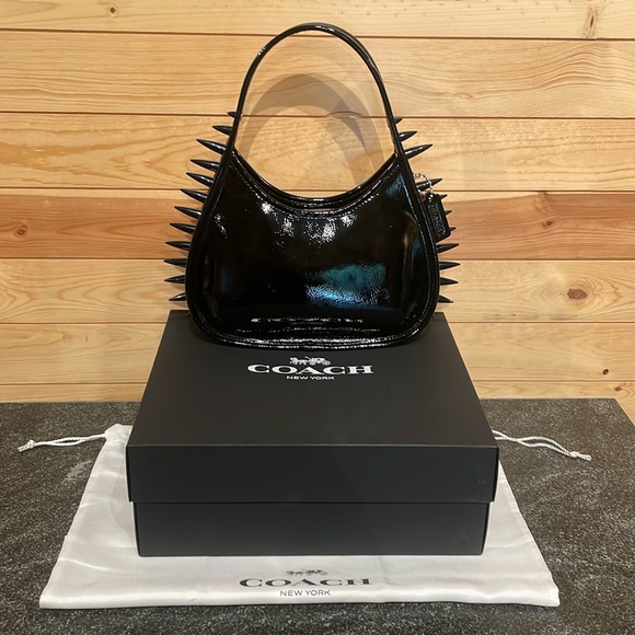 Coach Handbags - I🖤OFFERS! Coach Coachtopia Black Patent All Around Spikes Ergo Bag!